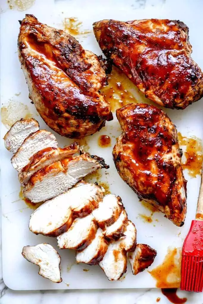cooking chicken on charcoal grill